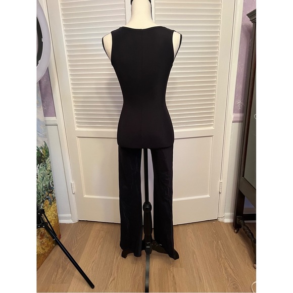 Black, SZ M, front zipper, flare leg, catsuit. - Picture 7 of 13